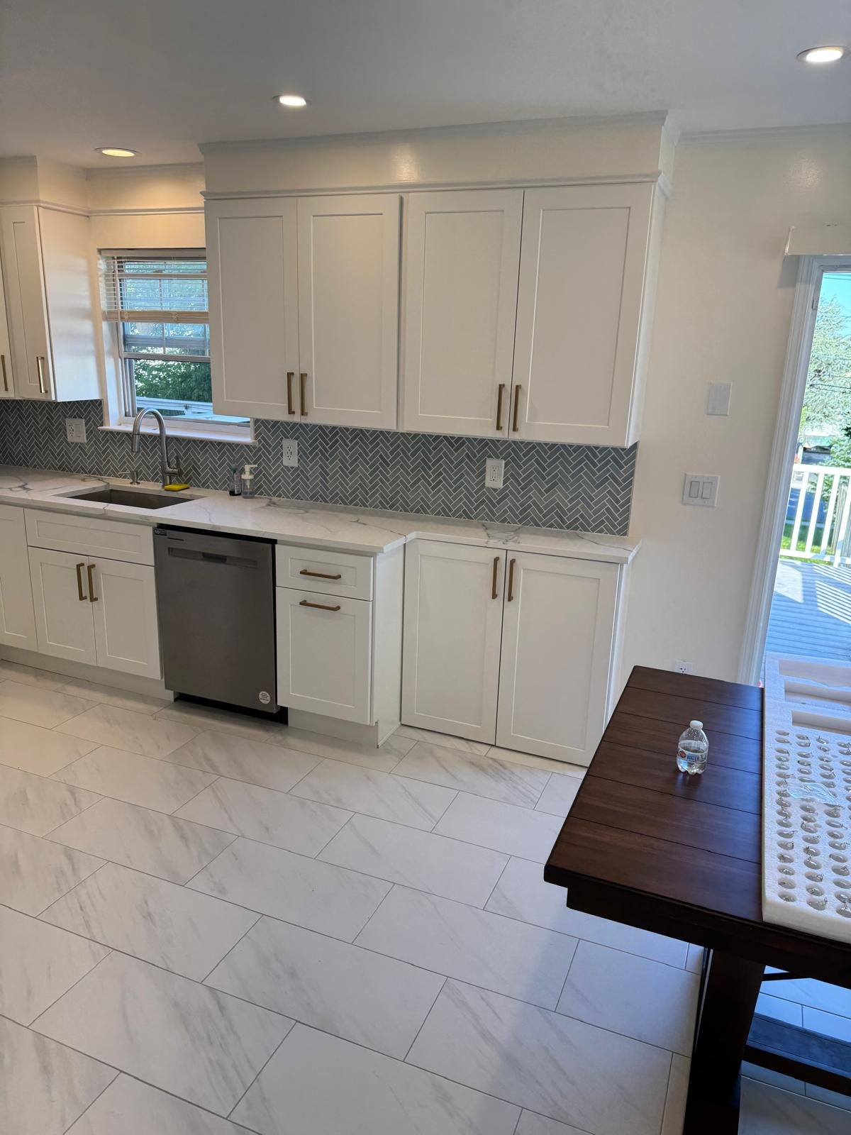Finished kitchen, sink and dishwasher